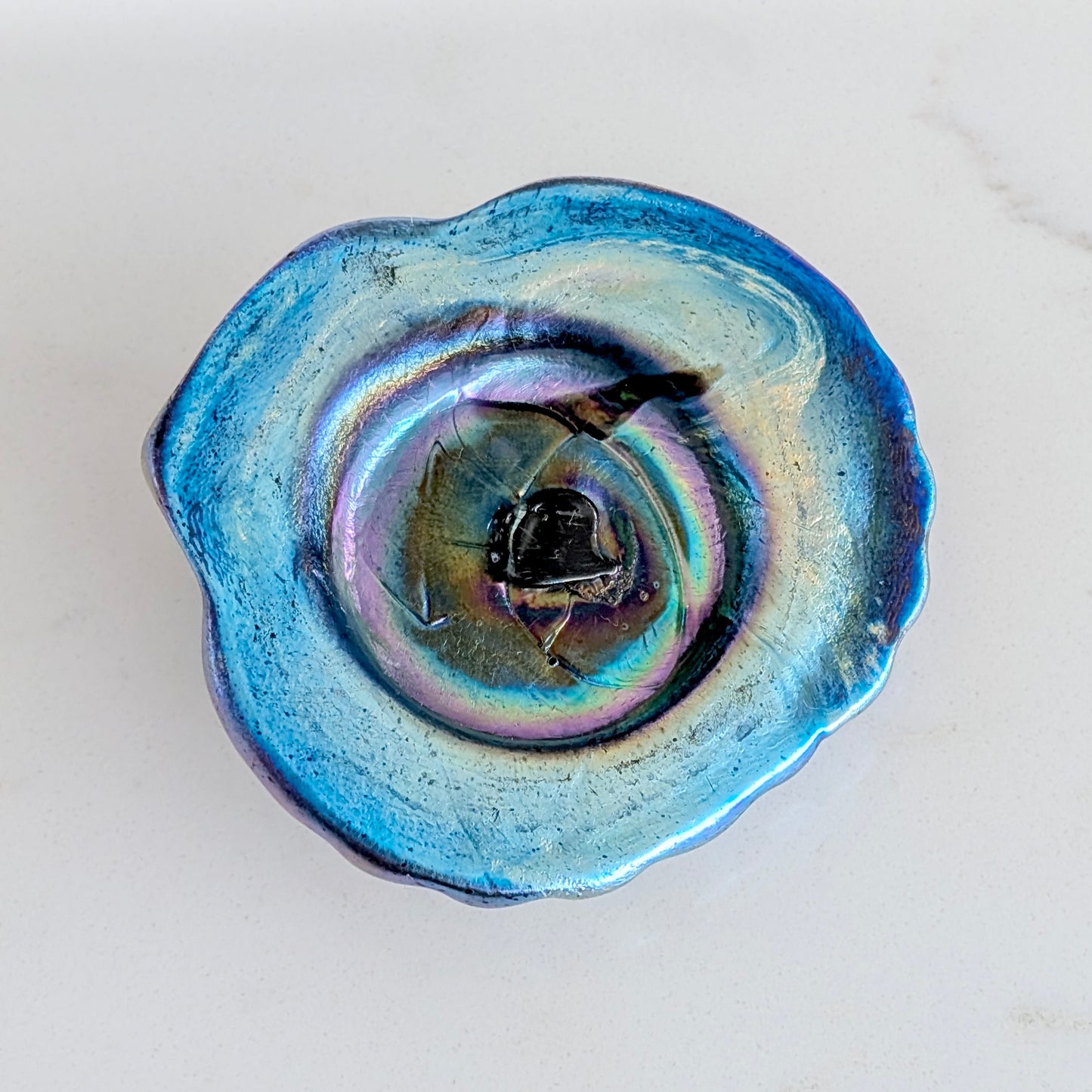 An Australian Iridescent Glass 'Seashell' Paperweight