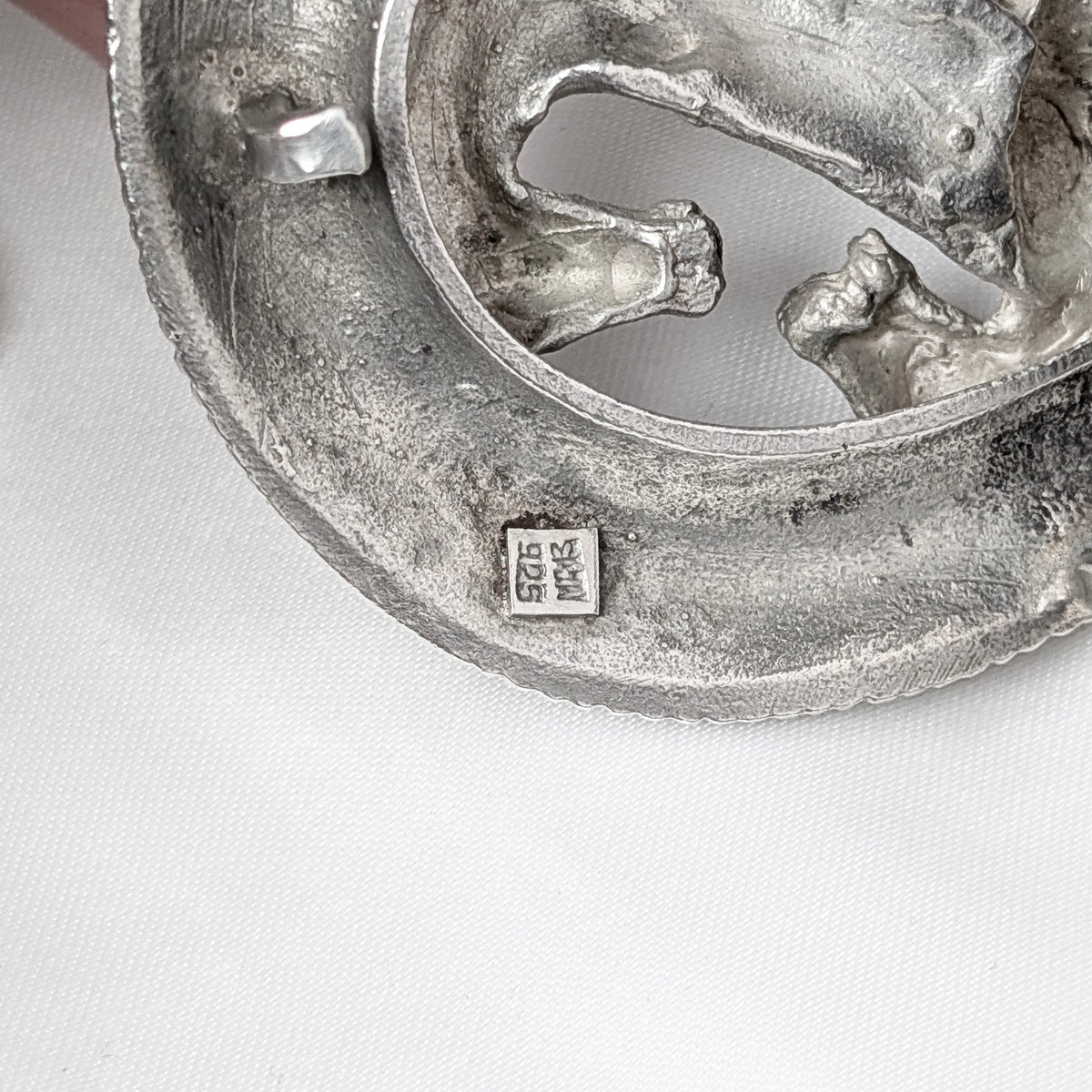 A Mexican Sterling Silver Rearing Horses Belt Buckle with Western Leather Belt