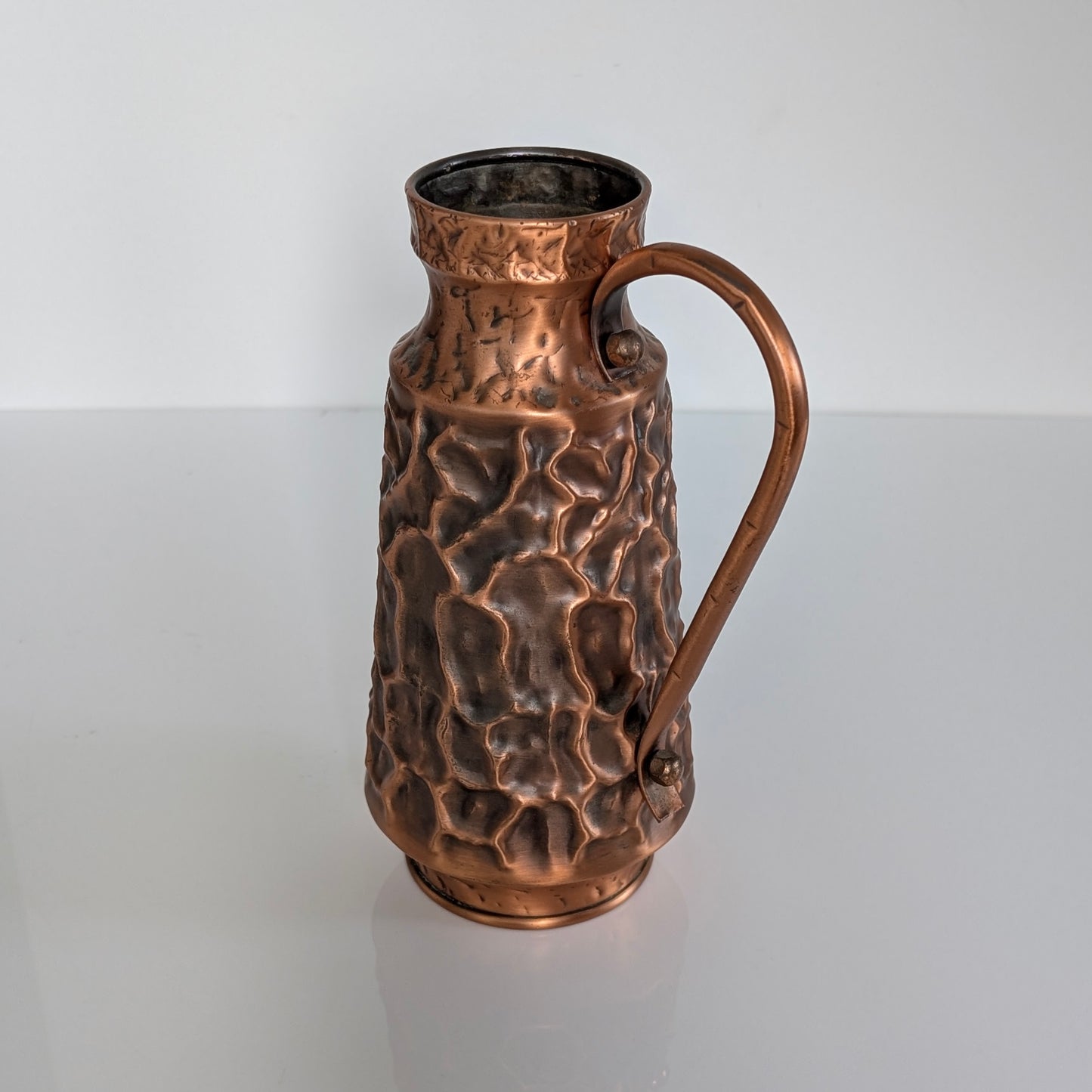 A Mid Century Textured Copper Jug