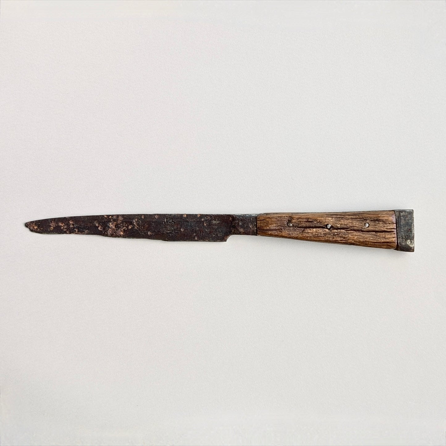 An Iron Scale-Tang Handle Knife, circa 1500 - 1600