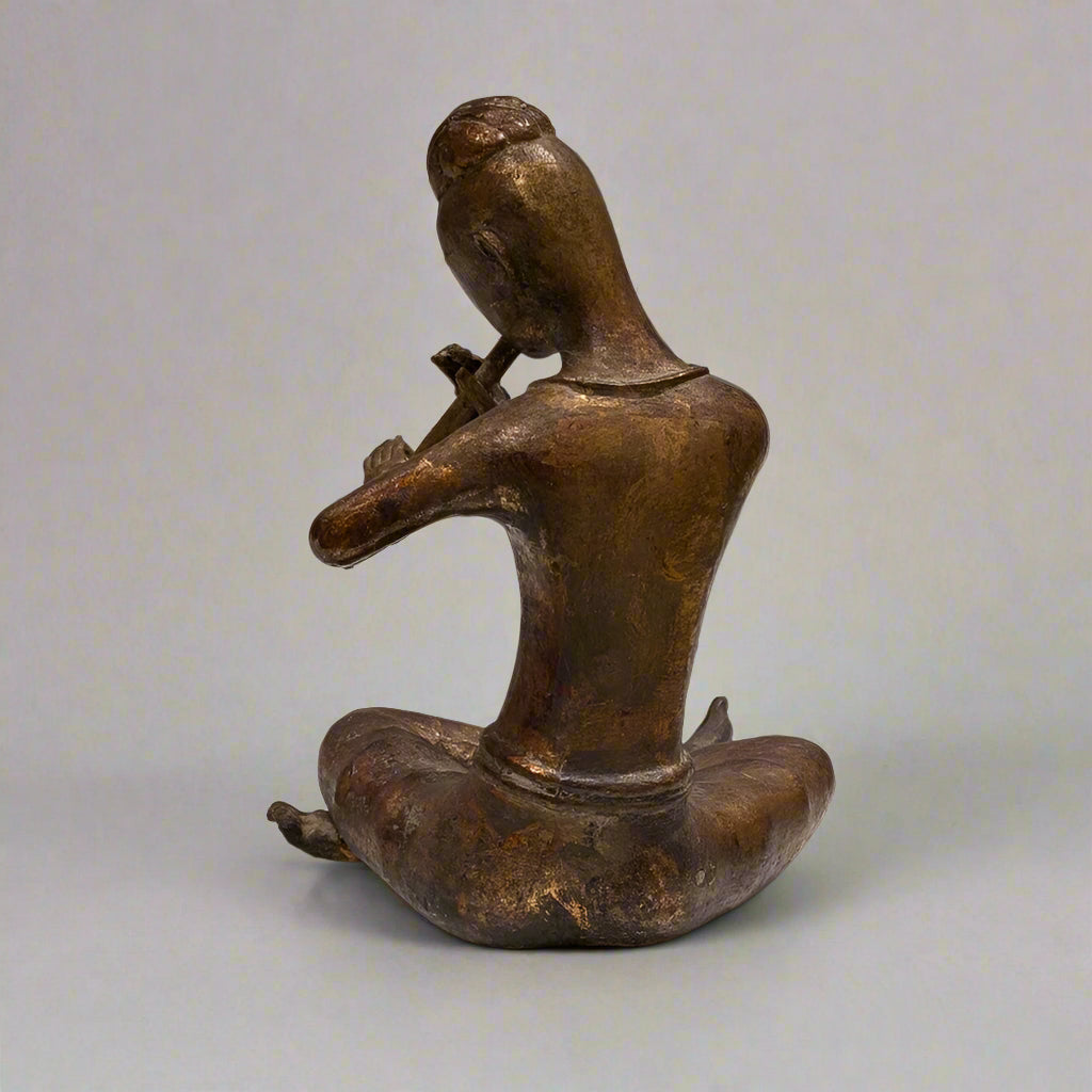 A Large Thai Gold-Gilt Bronze Flute Player, 20th Century