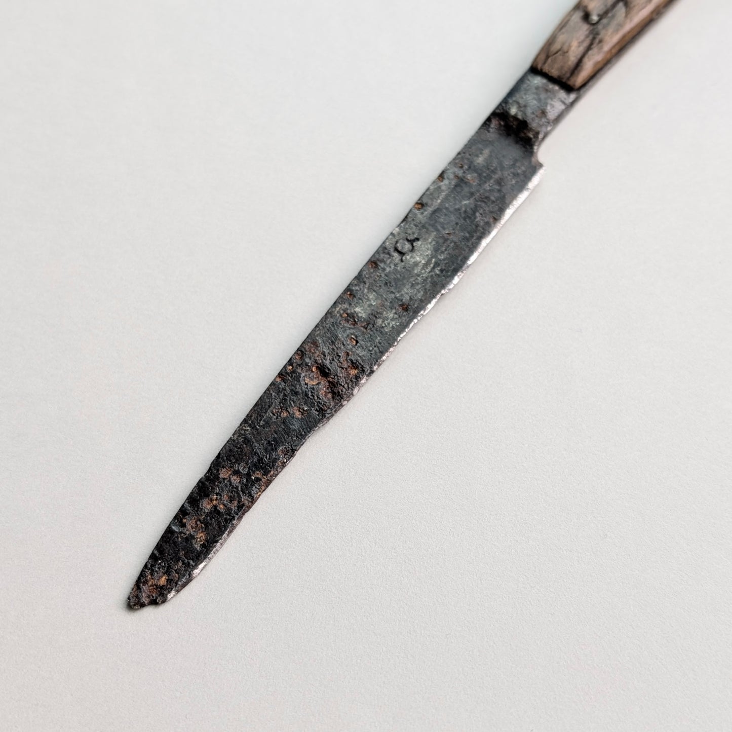 An Iron Scale-Tang Handle Knife, circa 1500 - 1600
