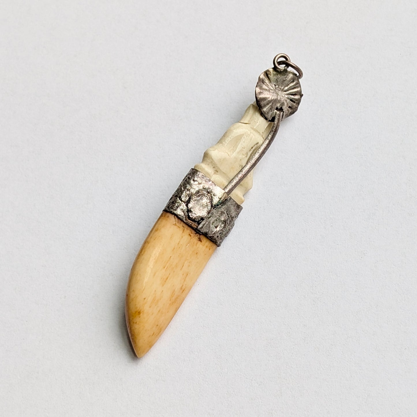 An Antique Southeast Asian Bone Amulet Pendant