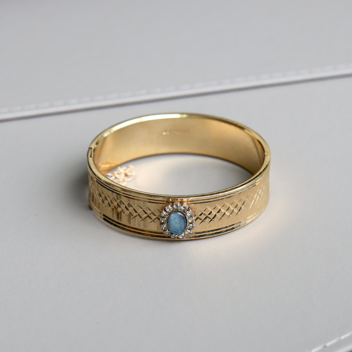 An Australian 22ct Gold Plated Opal Bangle Bracelet, c1980
