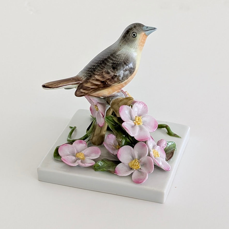 A HEREND Porcelain Bird with Pink Flowers