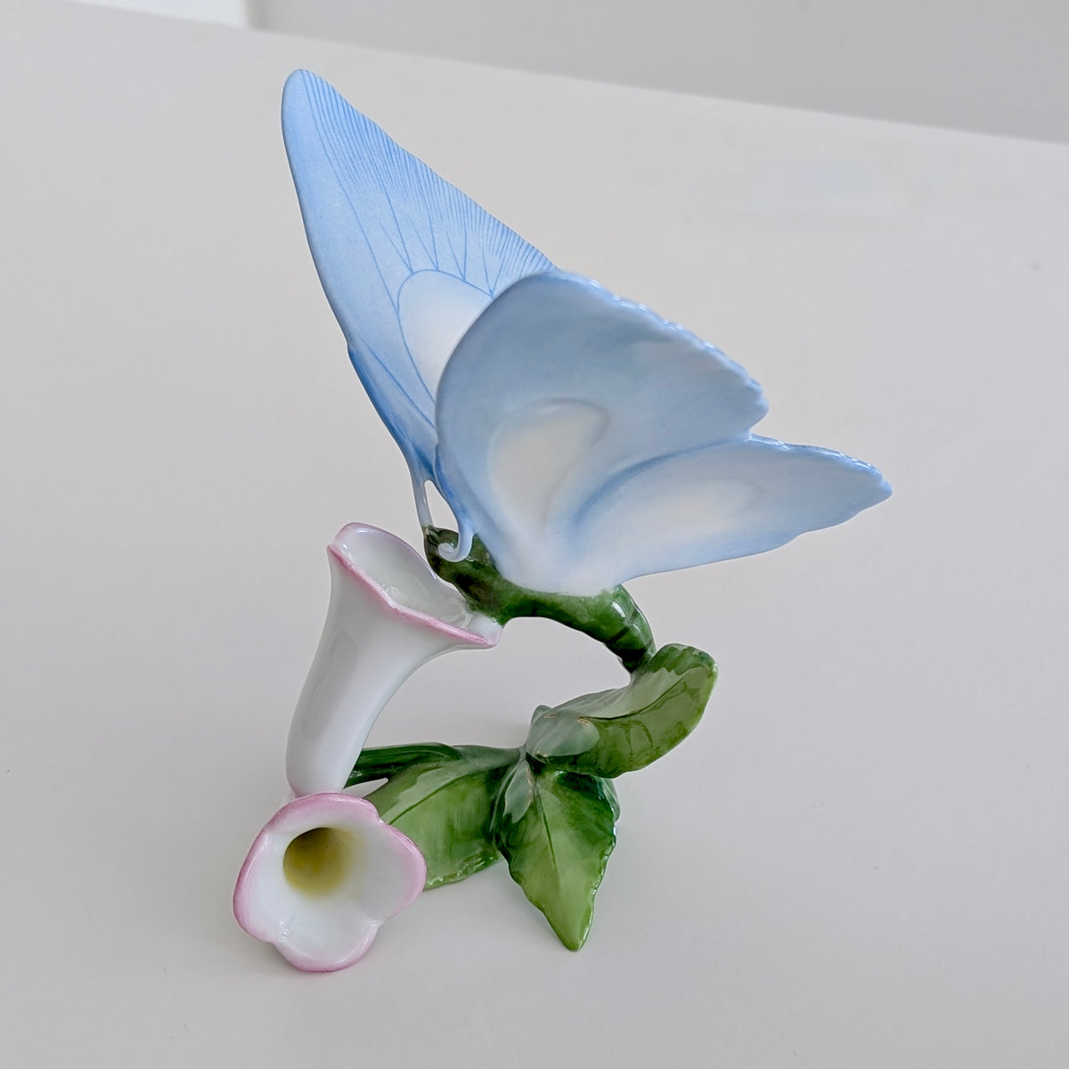 A Large HEREND Porcelain Blue Butterfly on Pink Flowers