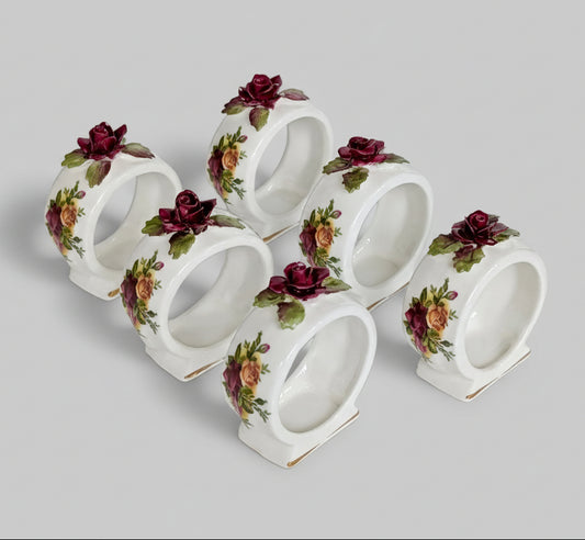 A Set of Six Royal Albert 'Old Country Roses' Napkin Rings