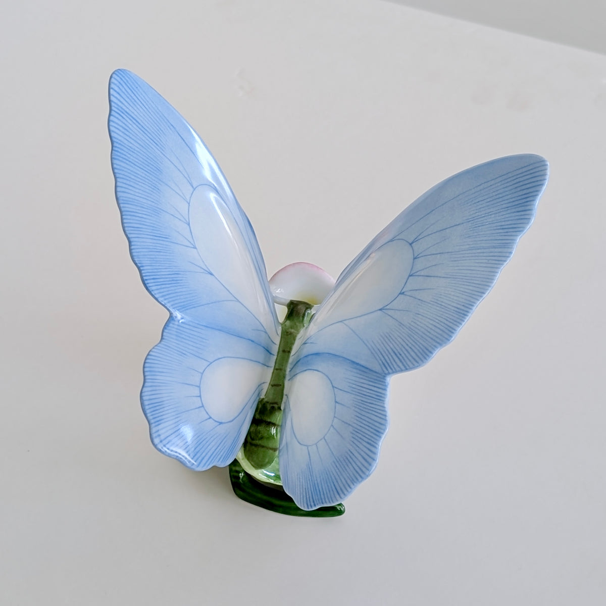 A Large HEREND Porcelain Blue Butterfly on Pink Flowers