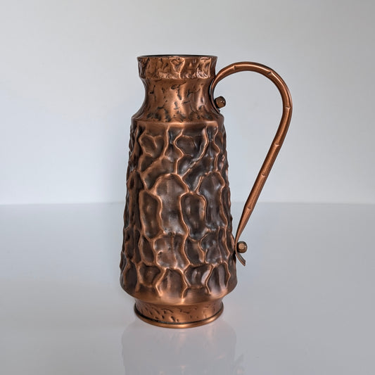 A Mid Century Textured Copper Jug