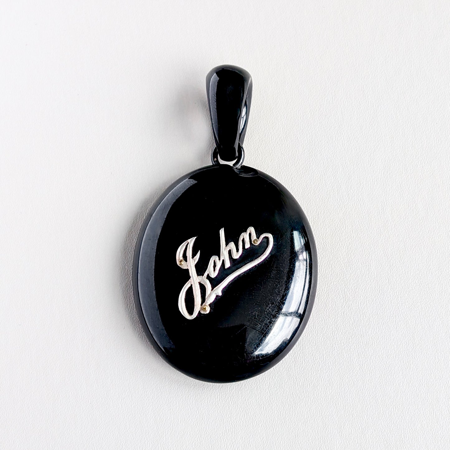 An Impressive Large Victorian Whitby Jet Mourning Locket, labeled "John", c1880