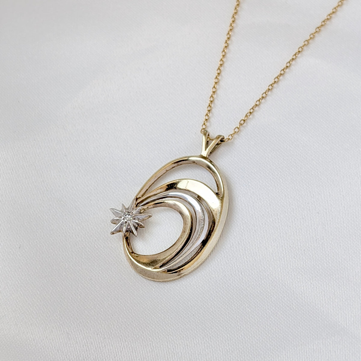 A Franklin Mint "Shooting Star" Diamond Pendant in Gold Plated Sterling Silver, 1985