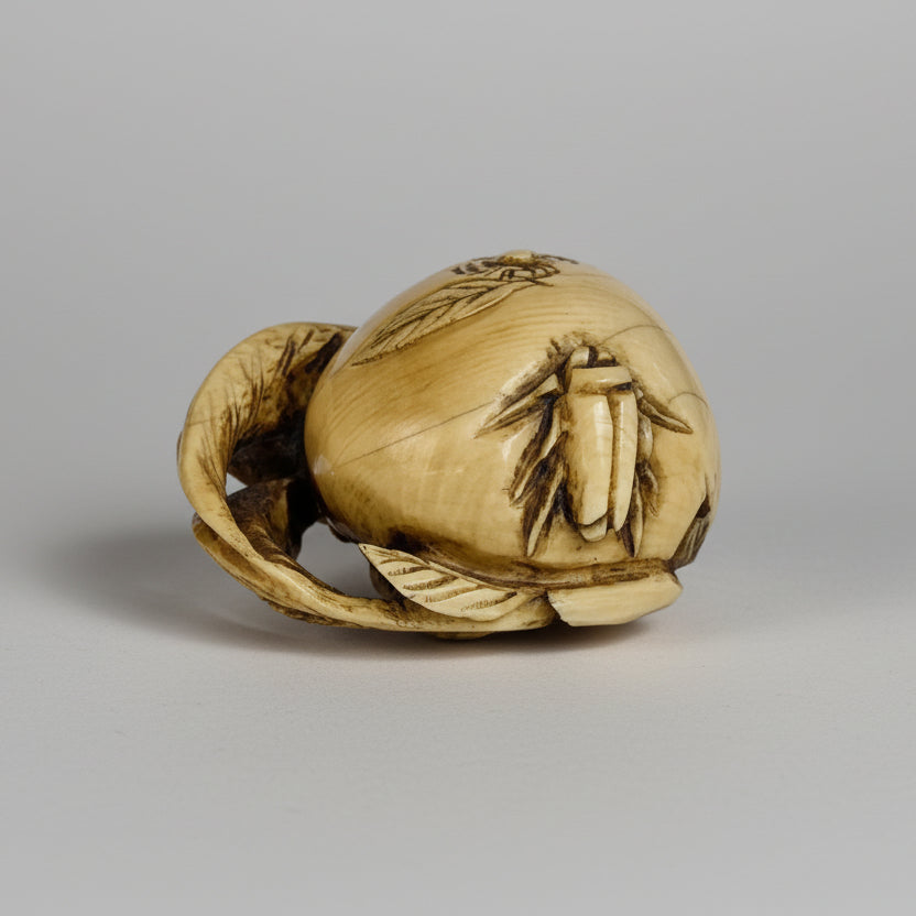 A Japanese Carved Ivory Netsuke, Taishō era