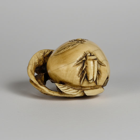A Japanese Carved Ivory Netsuke, Taishō era