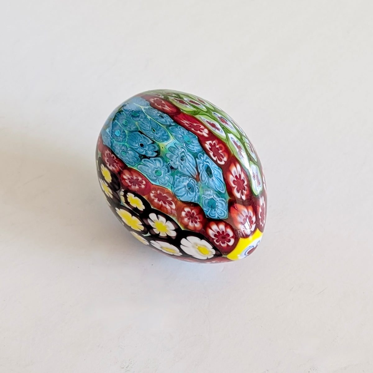A Millefiori Egg-Shaped Glass Paperweight