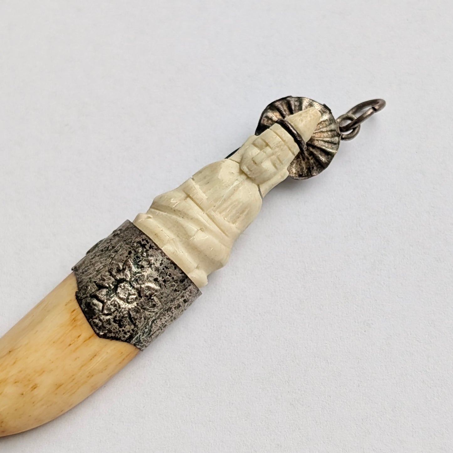 An Antique Southeast Asian Bone Amulet Pendant