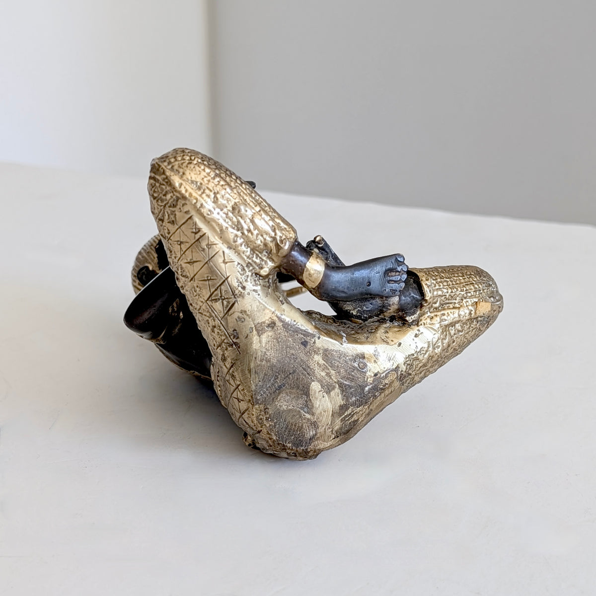 A Thai Gilt Bronze Celestial Musician, c1970's