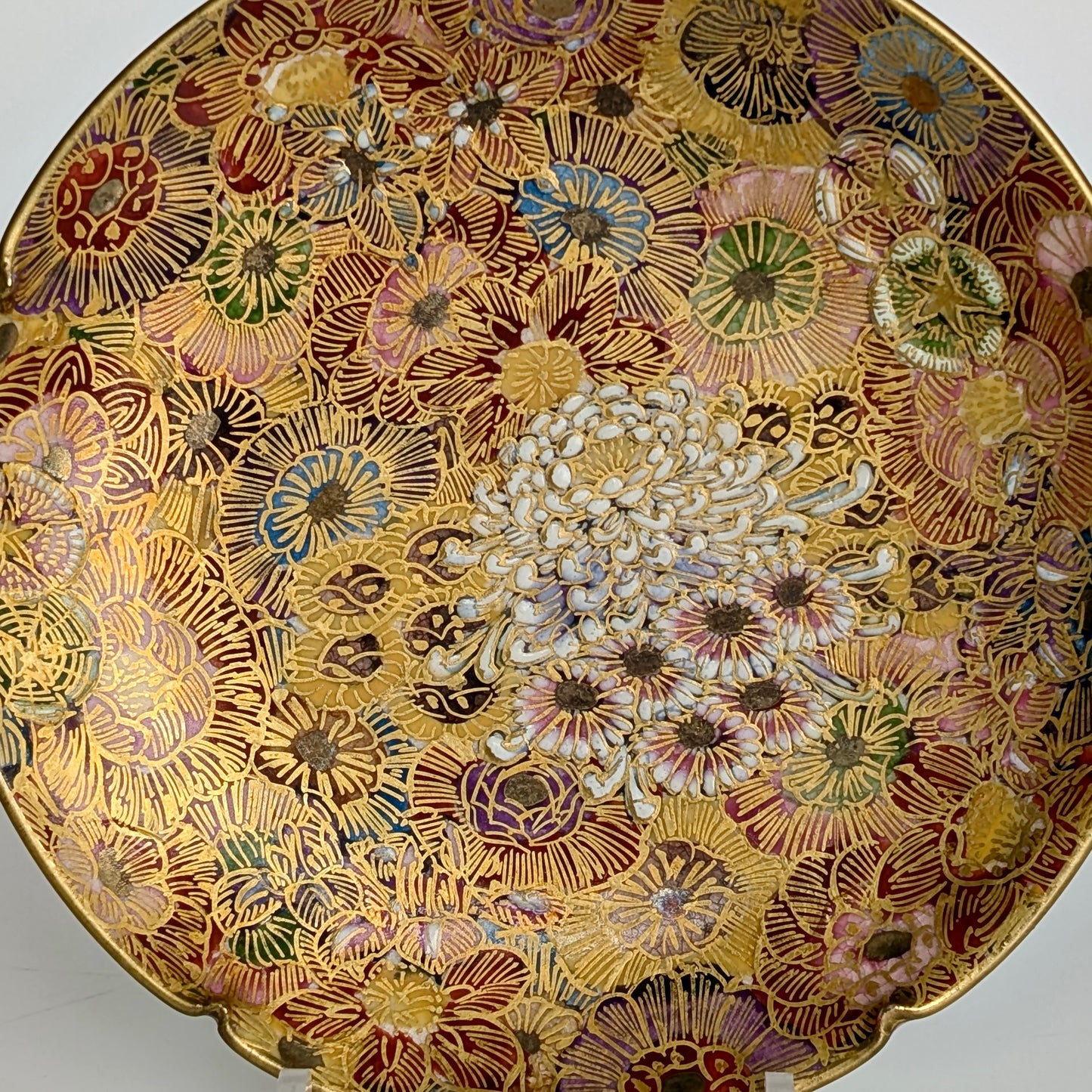 A Japanese Satsuma Pottery 'Millefleur' Plate, Signed Koshida
