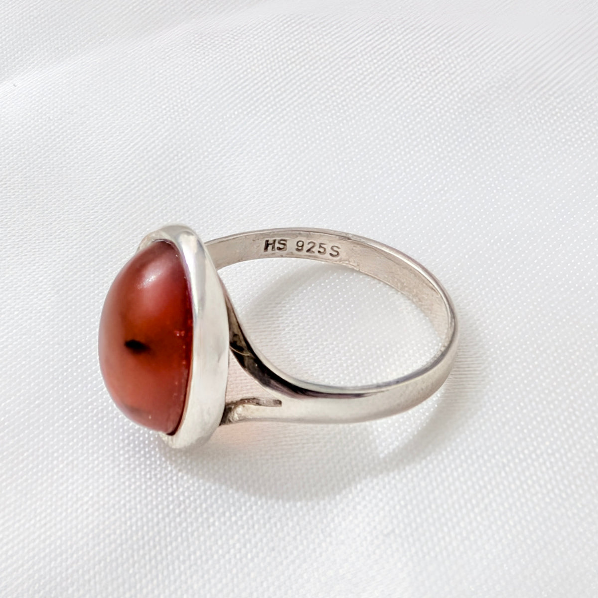 A Modernist Sterling Silver Baltic Amber Ring by Hermann Siersbøl, circa 1960