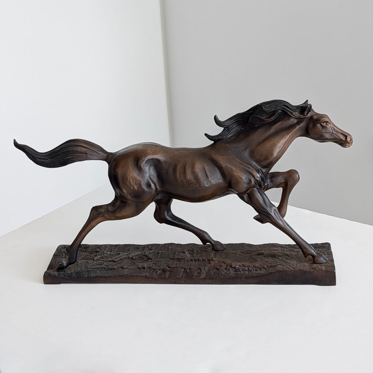A Large Murata Hiroshi "Galloping Horse" Cast Iron Sculpture