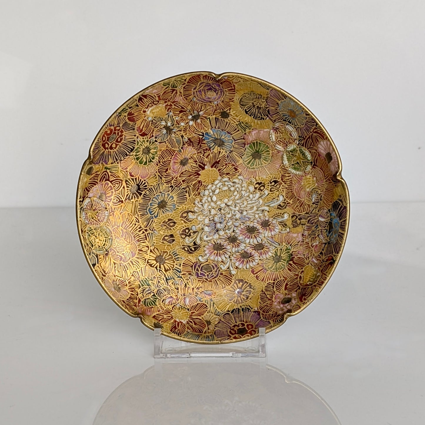 A Japanese Satsuma Pottery 'Millefleur' Plate, Signed Koshida