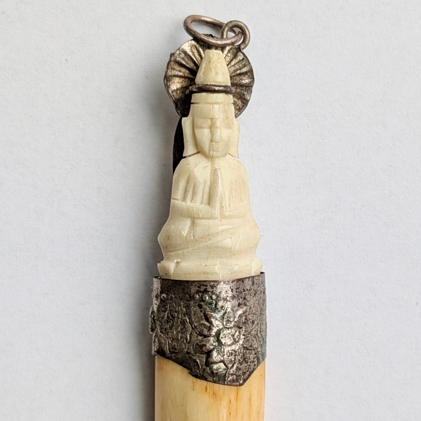 An Antique Southeast Asian Bone Amulet Pendant