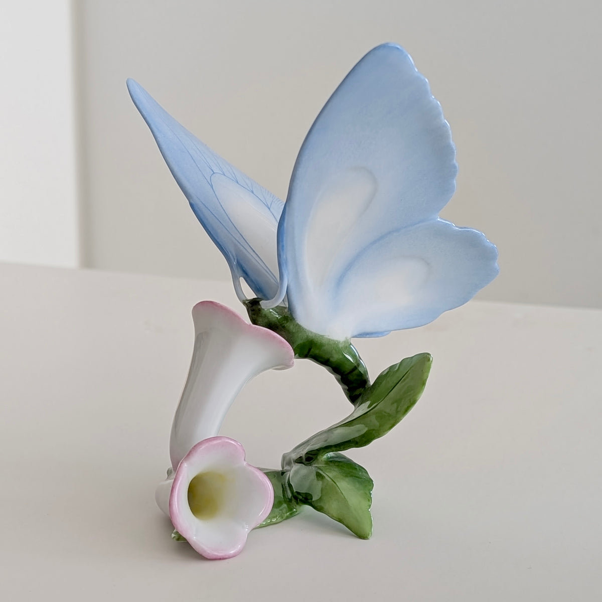 A Large HEREND Porcelain Blue Butterfly on Pink Flowers