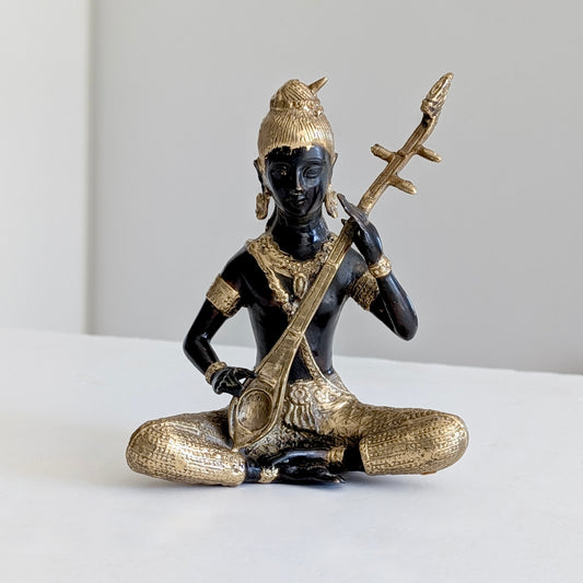 A Thai Gilt Bronze Celestial Musician, c1970's