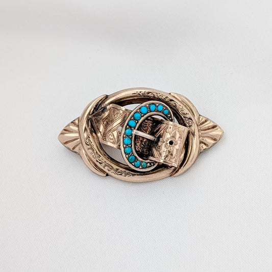 A Victorian 9ct Gold-Cased Turquoise "Buckle" Brooch, circa 1860