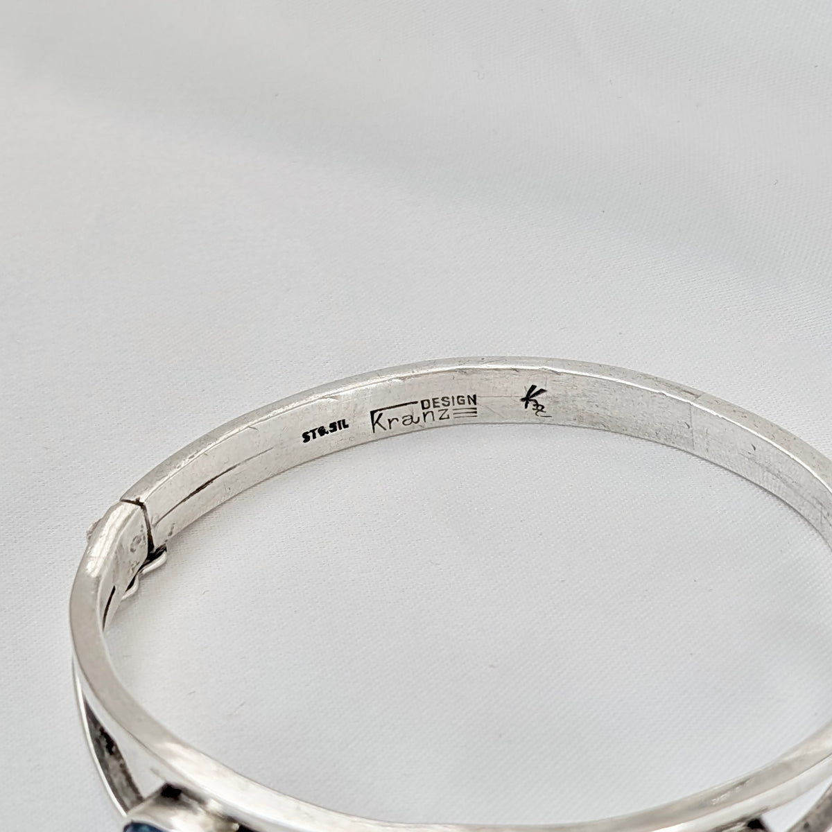 A Kranz & Ziegler Sterling Silver Australian Opal Bangle