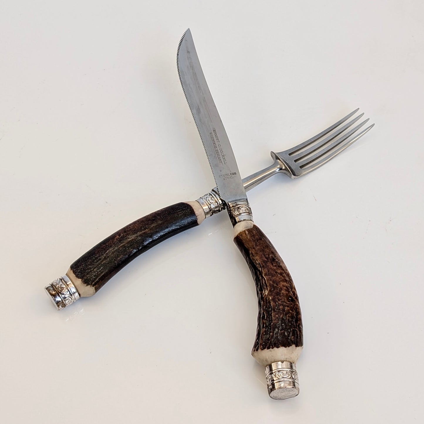Set of Antler-Handled Stainless Steel Steak Cutlery by Ernest Cockbill
