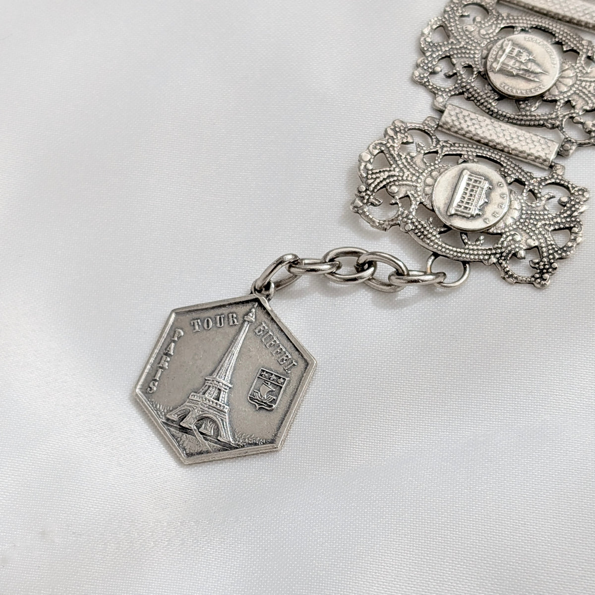 A Substantial French Parisien Travel Charm Bracelet in Silver Plate, circa 1940