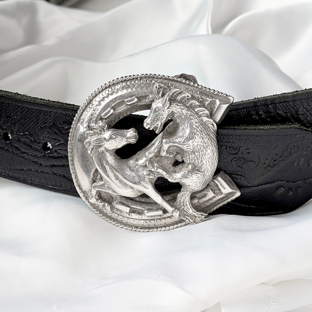 A Mexican Sterling Silver Rearing Horses Belt Buckle with Western Leather Belt