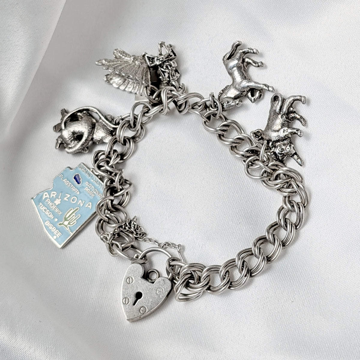 A Birmingham 1973 Sterling Silver Charm Bracelet