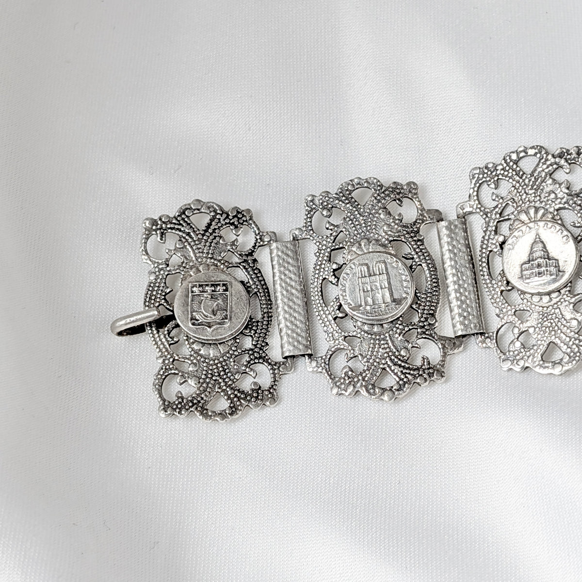 A Substantial French Parisien Travel Charm Bracelet in Silver Plate, circa 1940