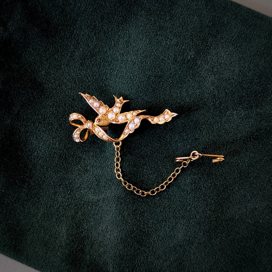 An Australian 15ct Gold Seed Pearl & Ruby Bird Brooch, c1900