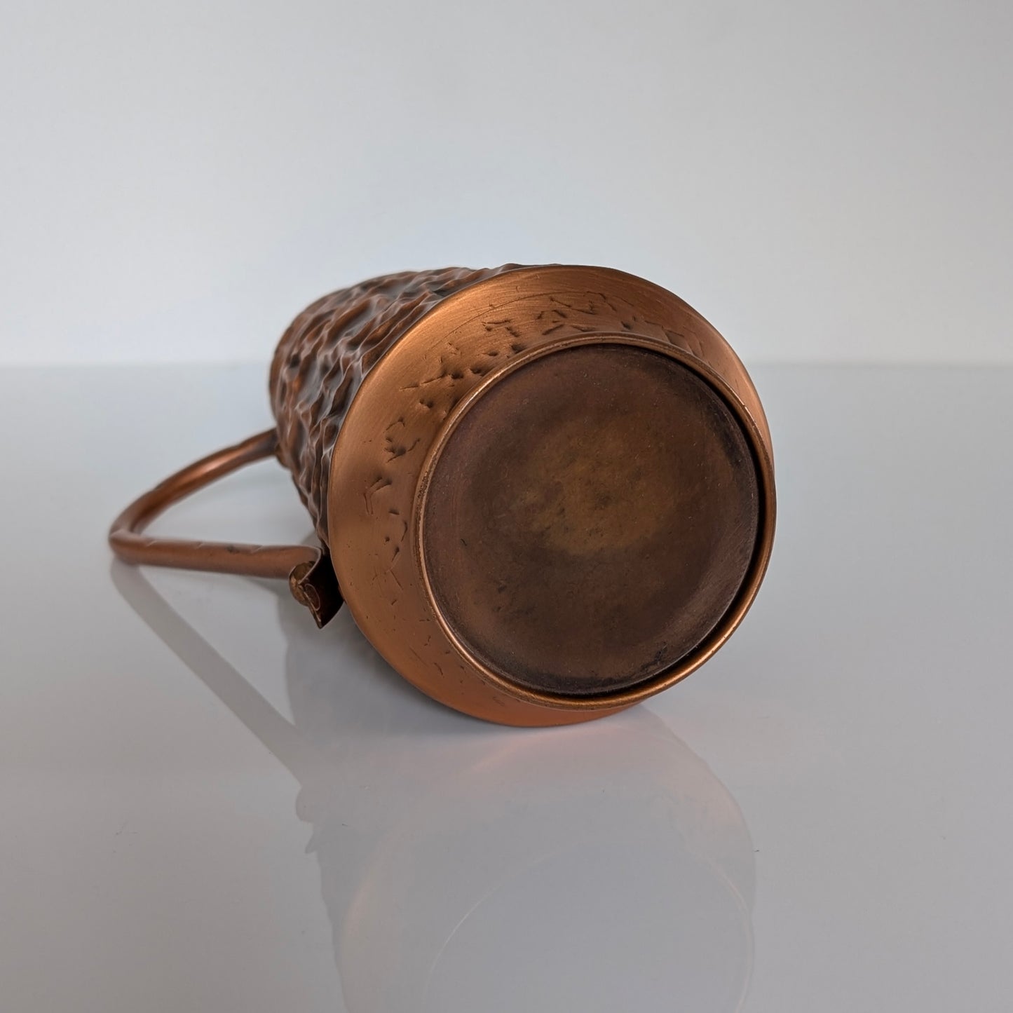A Mid Century Textured Copper Jug