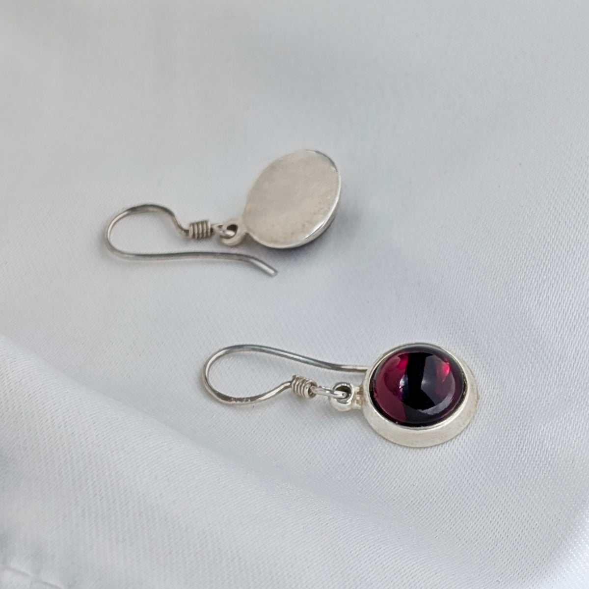 Pair of Sterling Silver Cabochon Red Garnet Hook Earrings