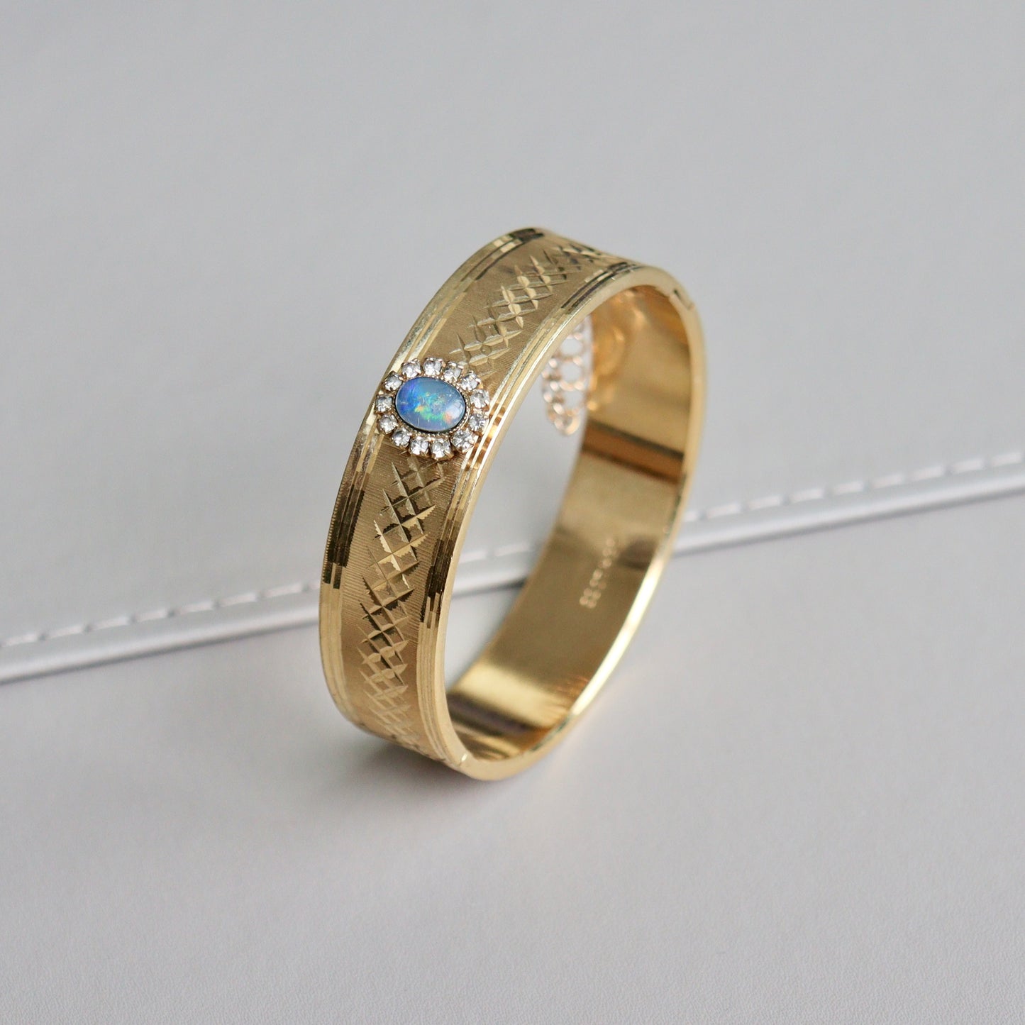 An Australian 22ct Gold Plated Opal Bangle Bracelet, c1980