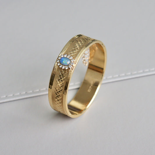 An Australian 22ct Gold Plated Opal Bangle Bracelet, c1980