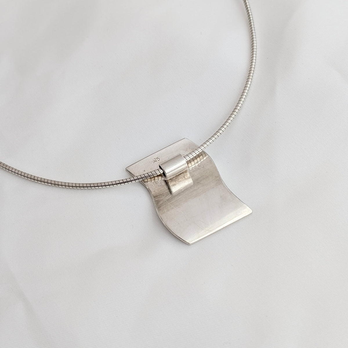 A Modernist Sterling Silver Pendant on Omega Chain