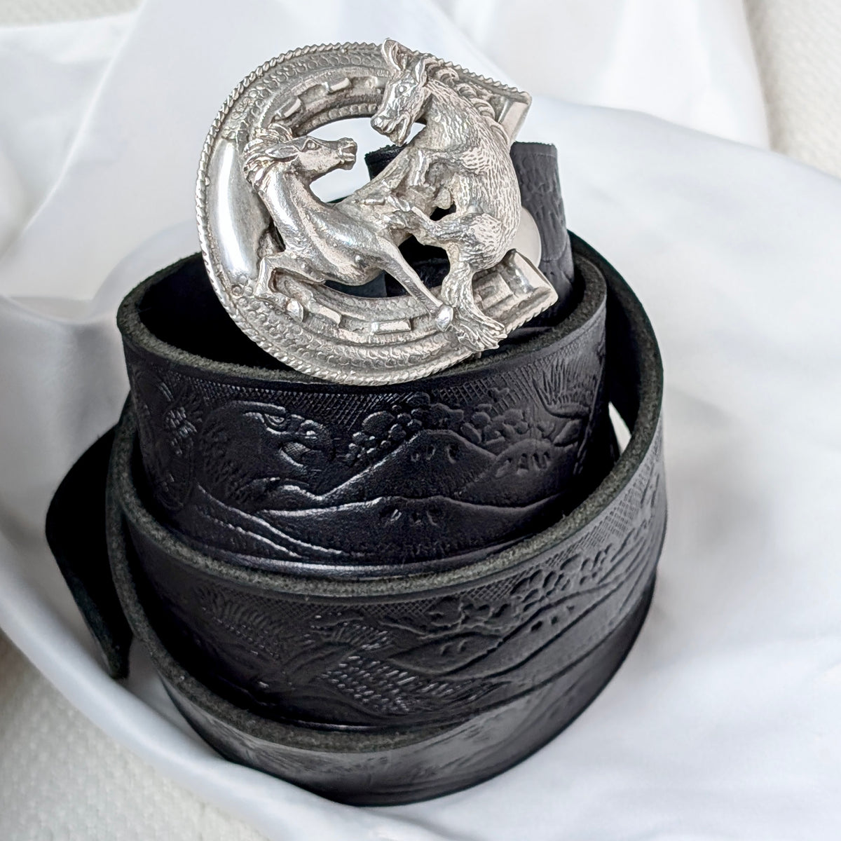 A Mexican Sterling Silver Rearing Horses Belt Buckle with Western Leather Belt