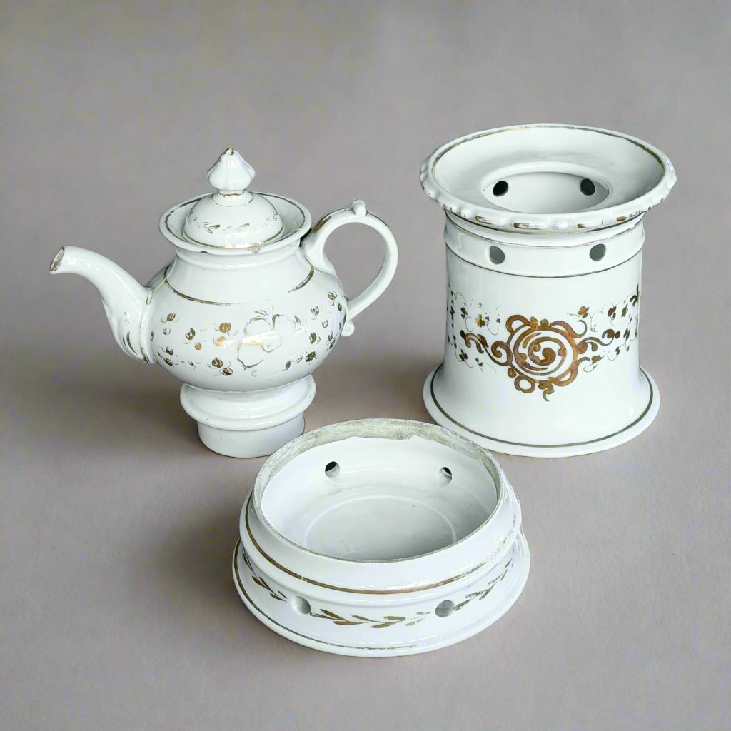 A Three-Piece Napoleon III Porcelain Demitasse Veilleuse