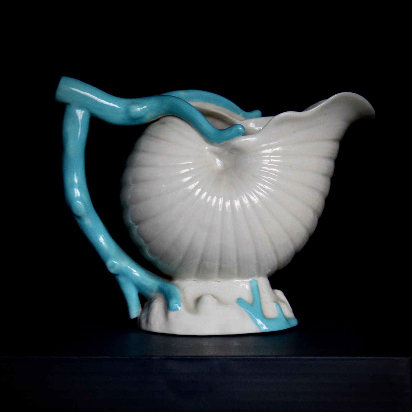 A Belleek Porcelain Nautilus Shell Jug, c1863-1890