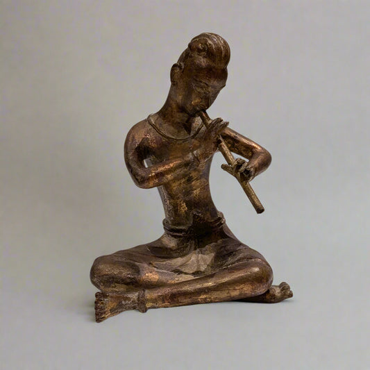 A Large Thai Gold-Gilt Bronze Flute Player, 20th Century