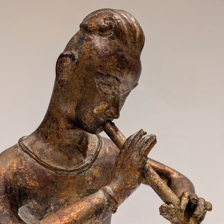 A Large Thai Gold-Gilt Bronze Flute Player, 20th Century