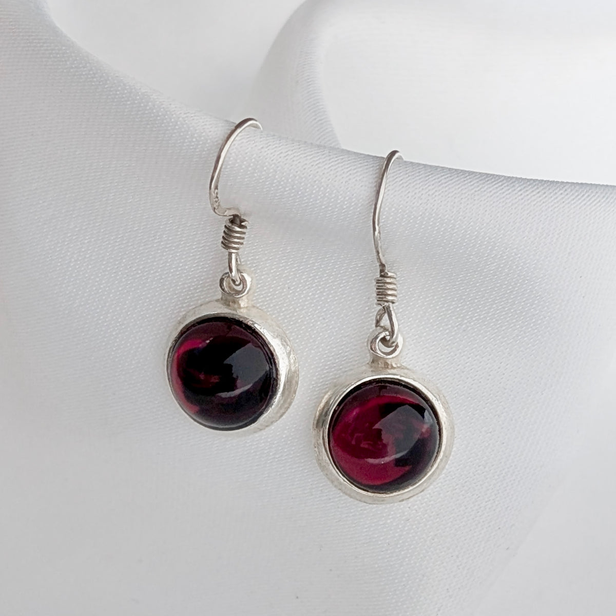Pair of Sterling Silver Cabochon Red Garnet Hook Earrings