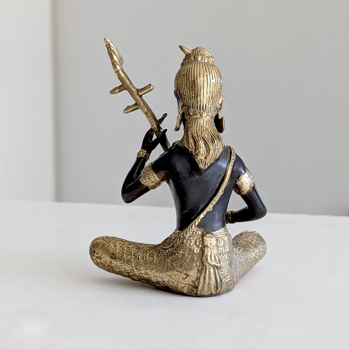 A Thai Gilt Bronze Celestial Musician, c1970's
