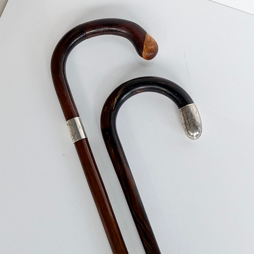 Two Antique Sterling Silver Mounted Walking Sticks