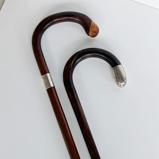 Two Antique Sterling Silver Mounted Walking Sticks