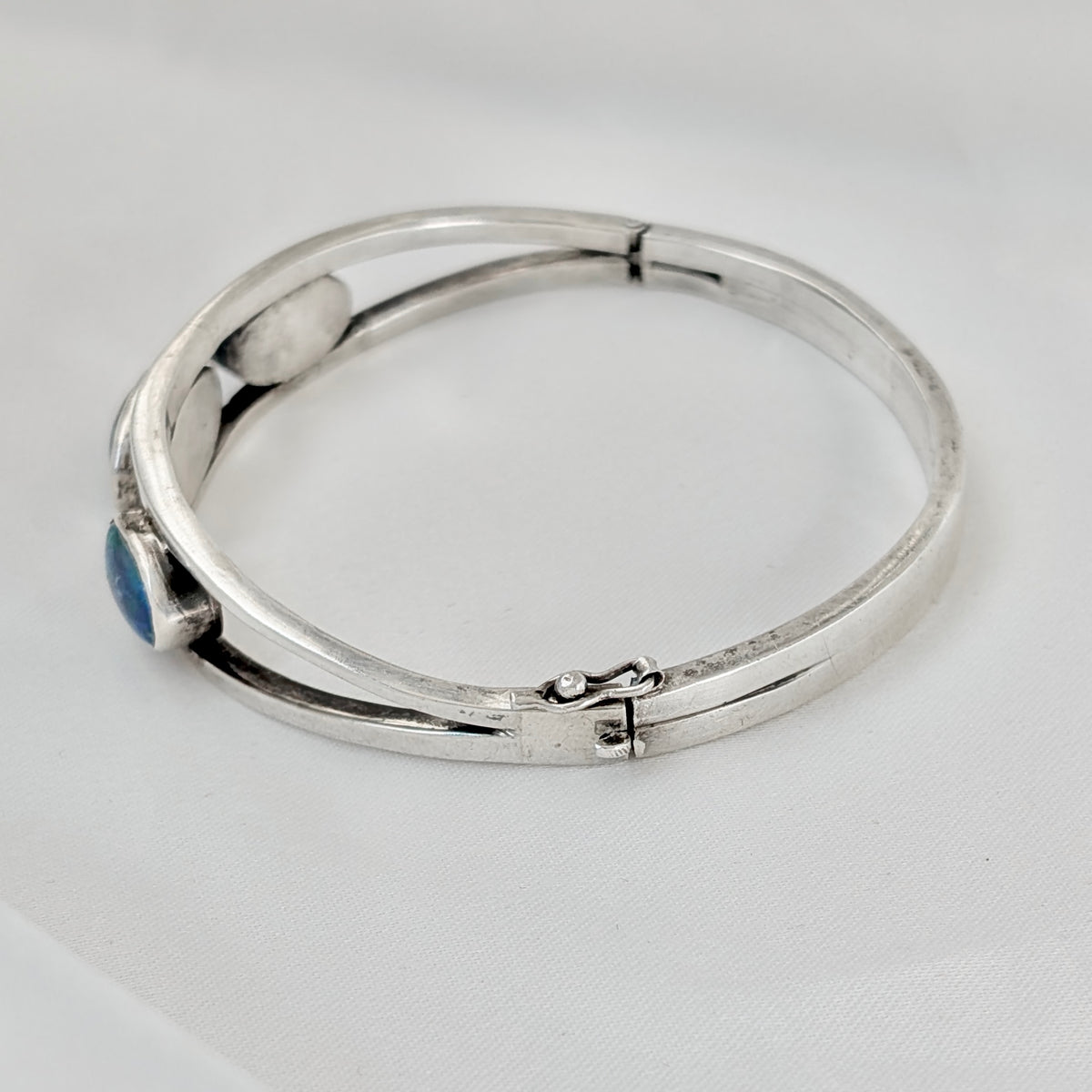 A Kranz & Ziegler Sterling Silver Australian Opal Bangle